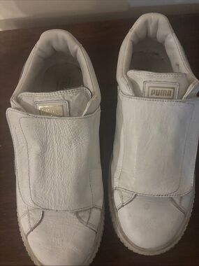 Puma White Leather Slip-On Sneakers with Gold Logo Accent